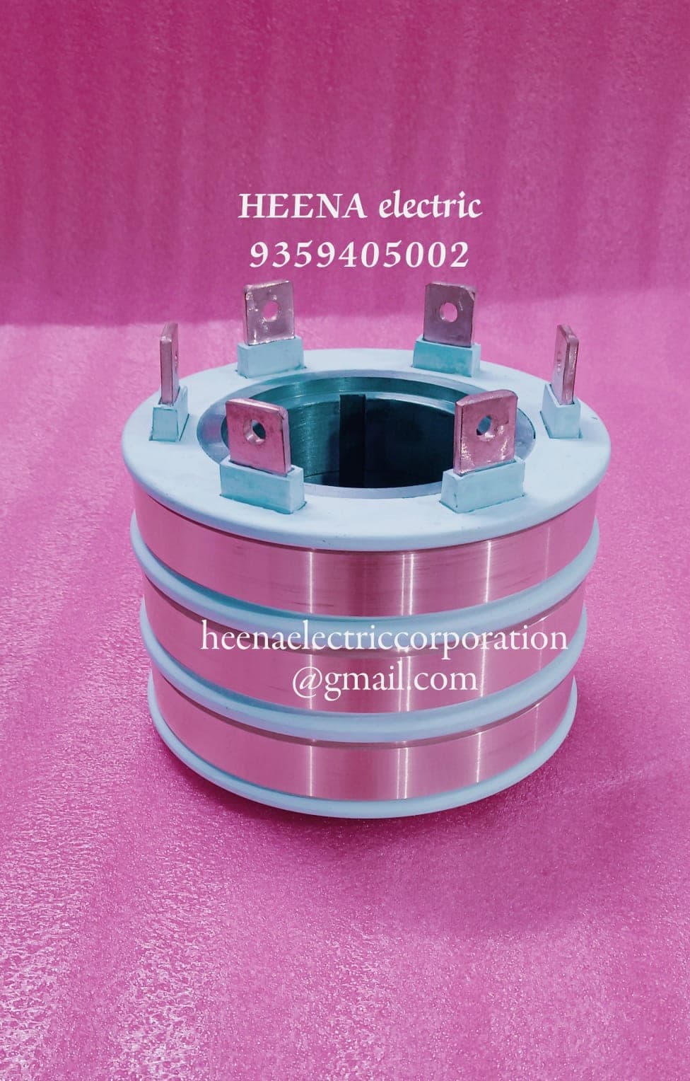 Copper slip ring assembly with terminal tabs by Heena Electric Corporation, slip ring manufacturer