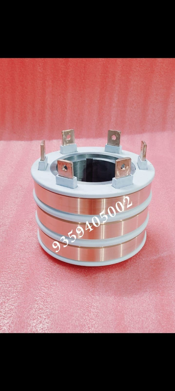 Copper slip ring with six terminal tabs made by Heena Electric Corporation slip ring manufacturer