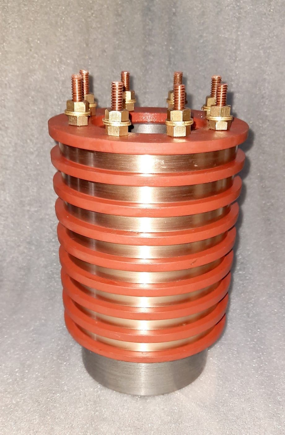 Eight-ring slip ring assembly with copper stud terminals by Heena Electric Corporation