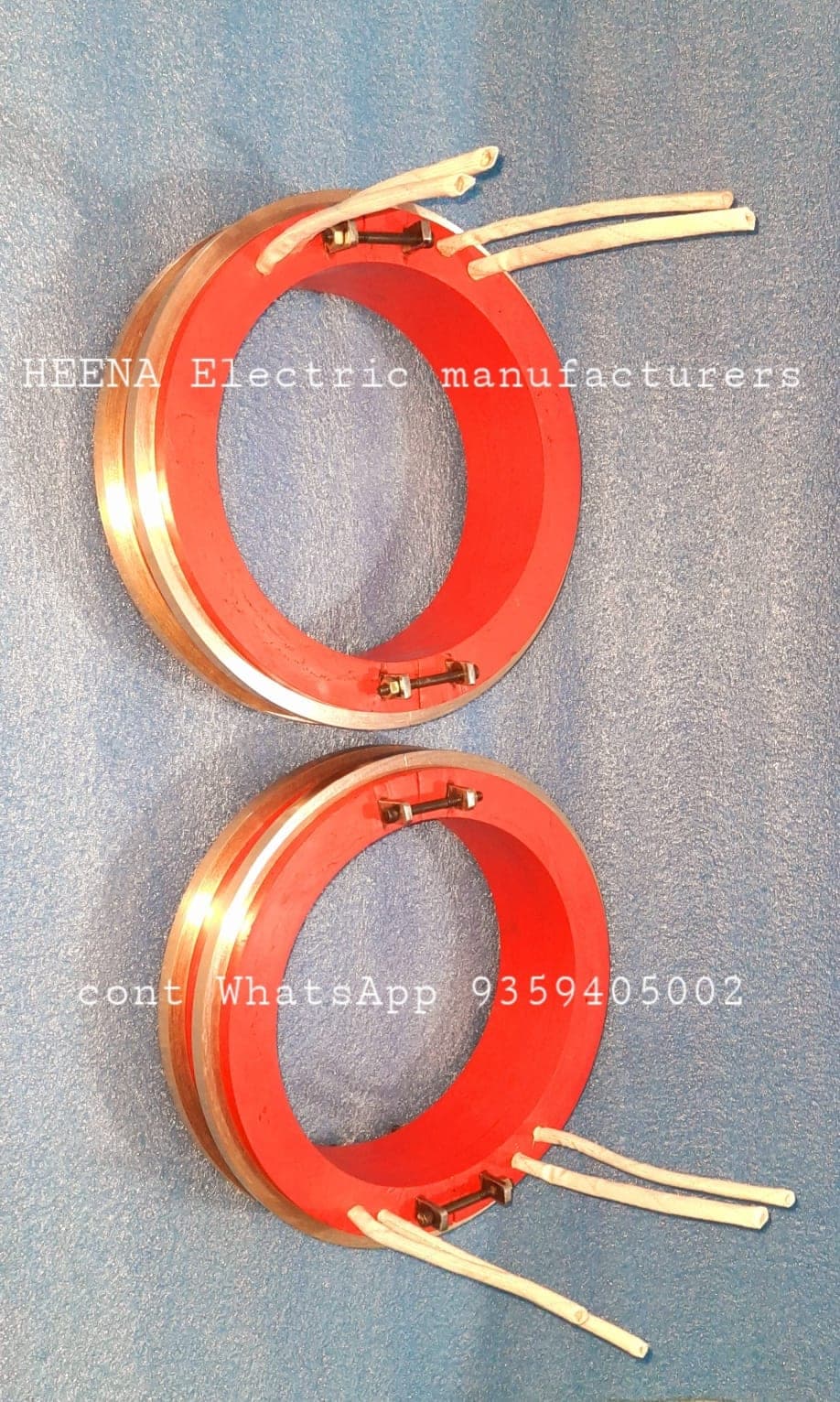 Two large ring type slip rings with lead wires manufactured by Heena Electric Corporation