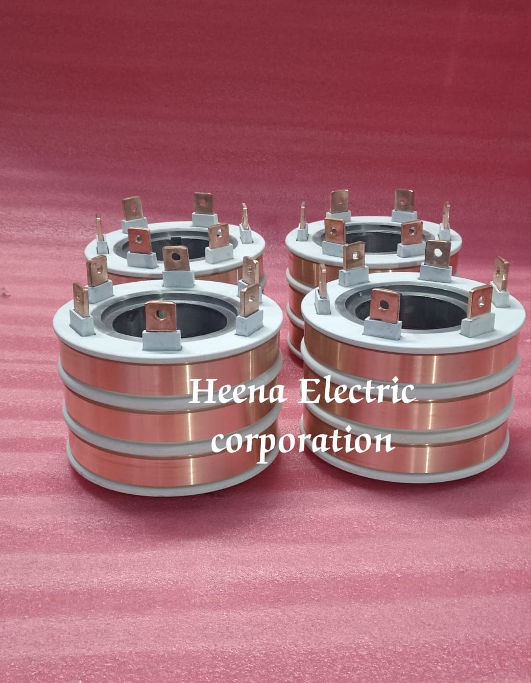 Four copper slip ring assemblies produced by Heena Electric Corporation, watermarked batch photo