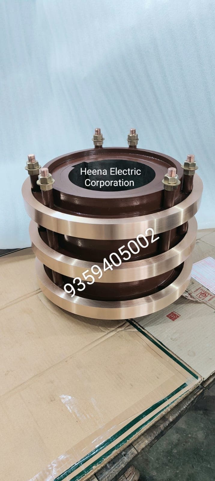 Copper slip ring assembly with brass hardware manufactured by Heena Electric Corporation