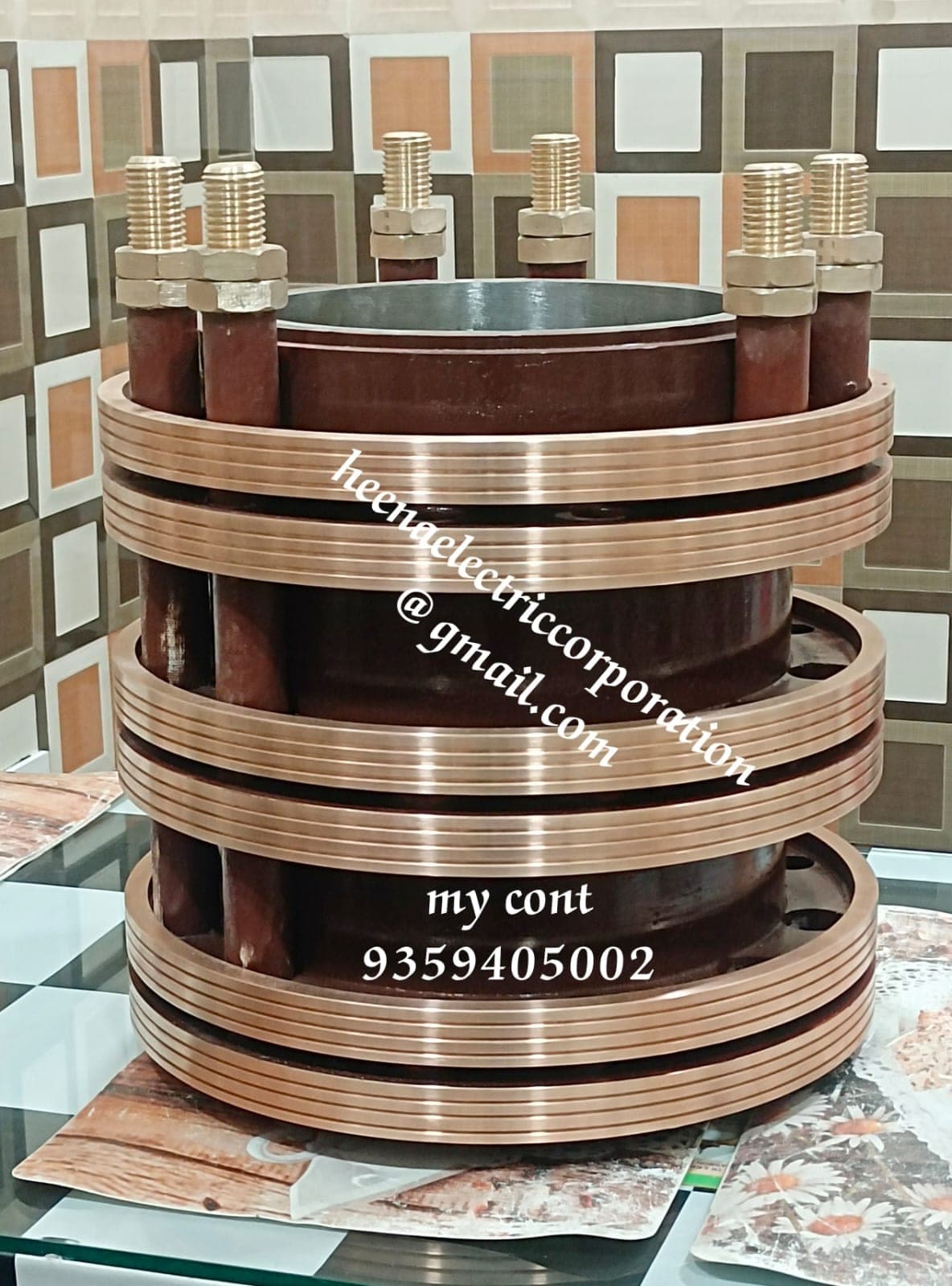 Multi-ring grooved copper slip ring stack for high-power motors by Heena Electric Corporation