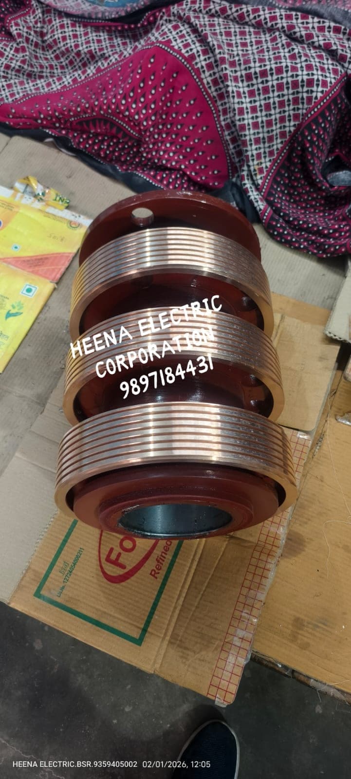 Helically grooved copper slip ring showing machined bore, manufactured by Heena Electric Corporation