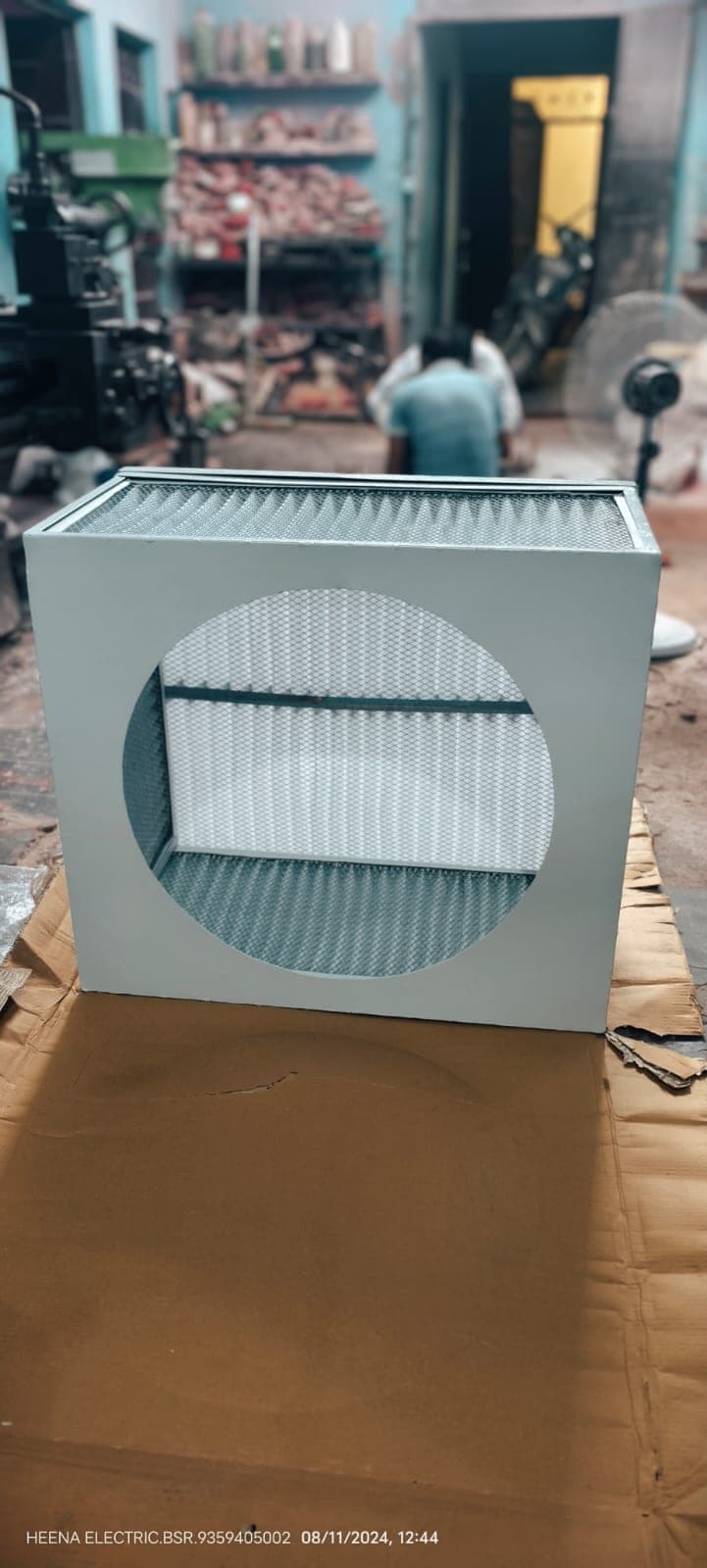 Custom fabricated air filter housing with circular inlet built at the Heena Electric Corporation workshop