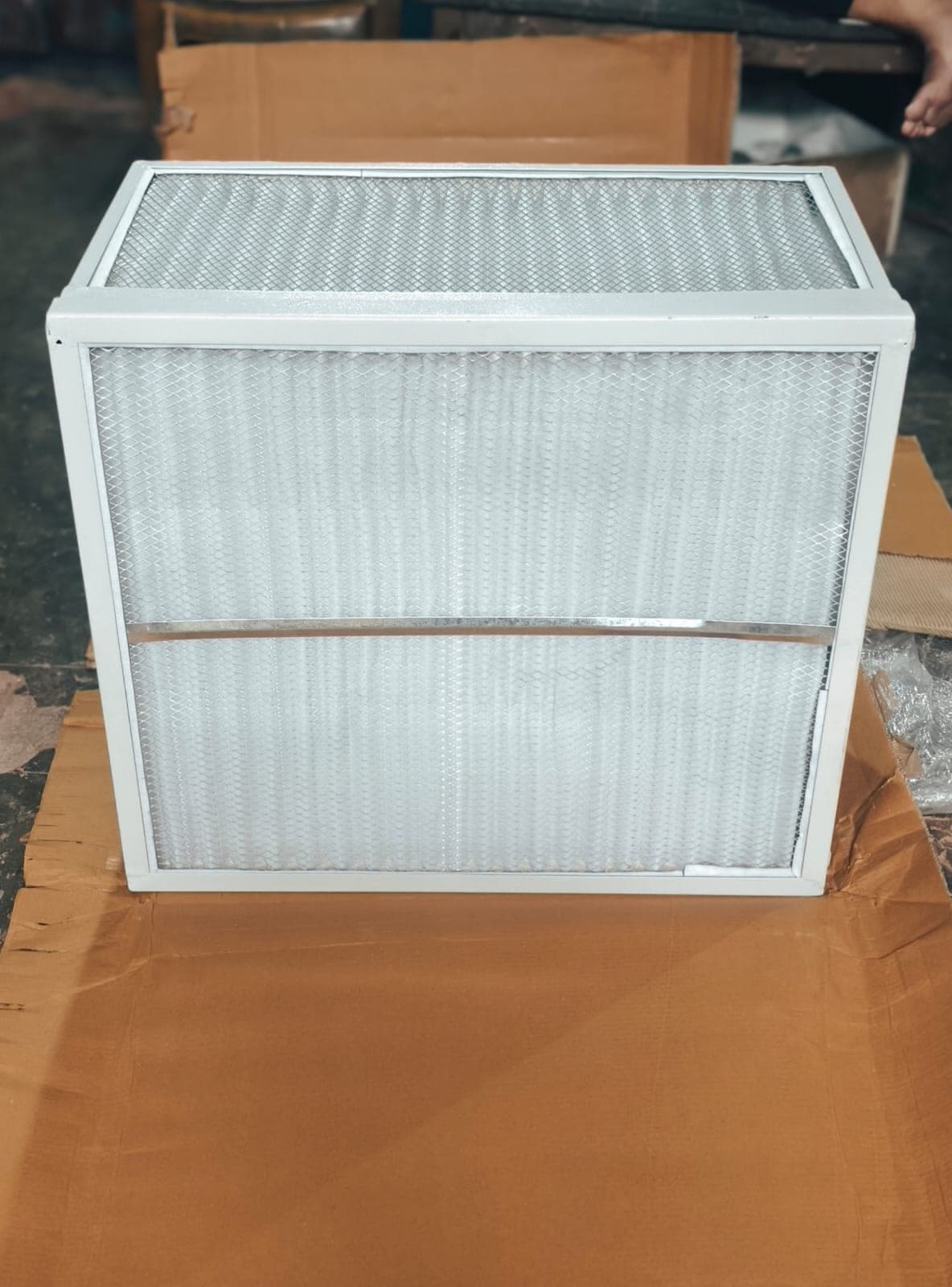 Industrial pleated air filter panel with wire mesh guard manufactured by Heena Electric Corporation